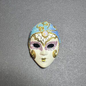 VTG Blue Gold & Pink Raised Glitter Pattern Ceramic Masked Face Brooch 2 x 1.38"